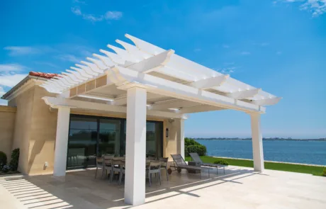 Cellular PVC Pergola on back patio overlooking the water